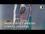 Una ciudad china construye un puente alrededor de una casa que su dueña no quiere vender