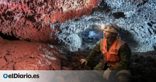 Descenso al ‘tubo rojo’ en el interior del volcán de La Palma: la vida se abre paso en la boca del infierno