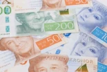 Suecia, el país que casi no usa efectivo, pide a sus ciudadanos guardar billetes ante posibles crisis en los pagos