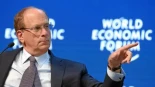 El jefe mundial de BlackRock se cita en secreto con el Ibex en Madrid en pleno choque de Sánchez con Trump
