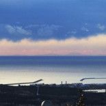 El viento seco permite fotografiar Mallorca desde Cataluña