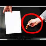 Apagando una televisión con un papel y un mechero